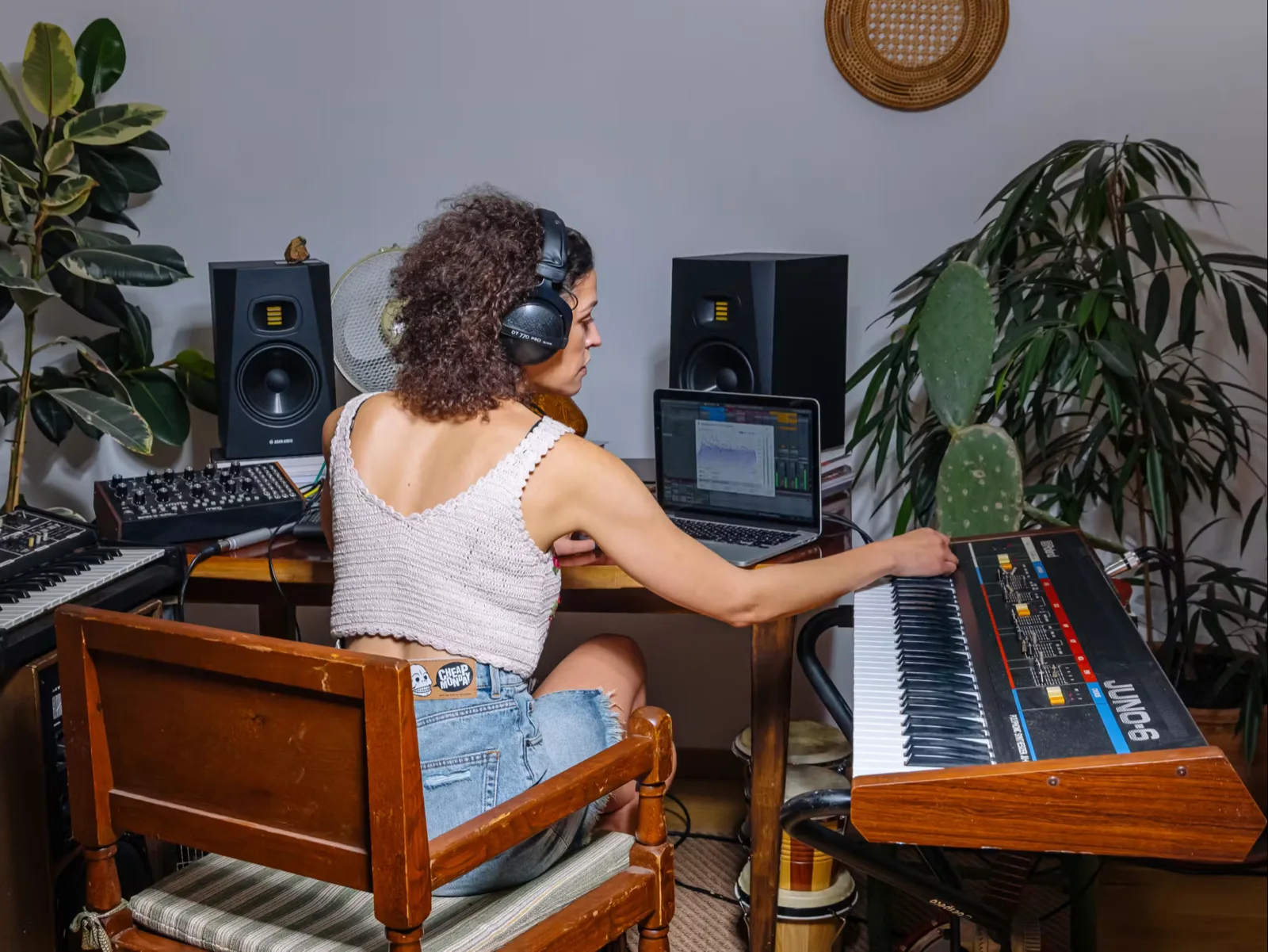 A working project studio with monitors, synths and no acoustic treatment